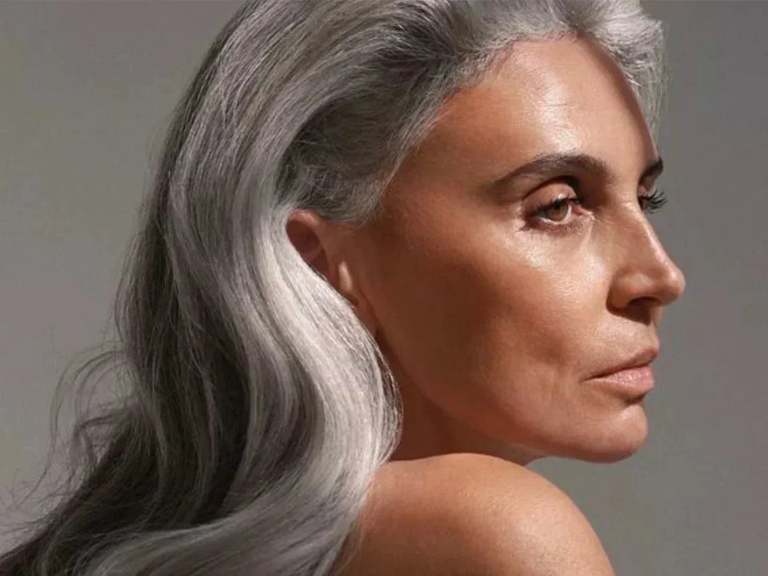 Photo of mature woman with long, white hair